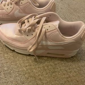 Light pink air maxes.